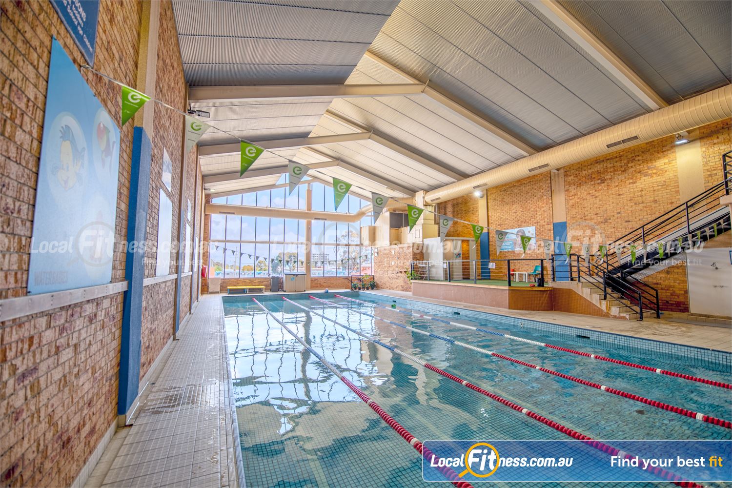 Genesis Health + Fitness Dandenong The brightly lit Dandenong swimming pool at Genesis Health + Fitness.