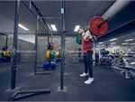 Strength training in our lifting Cage area.