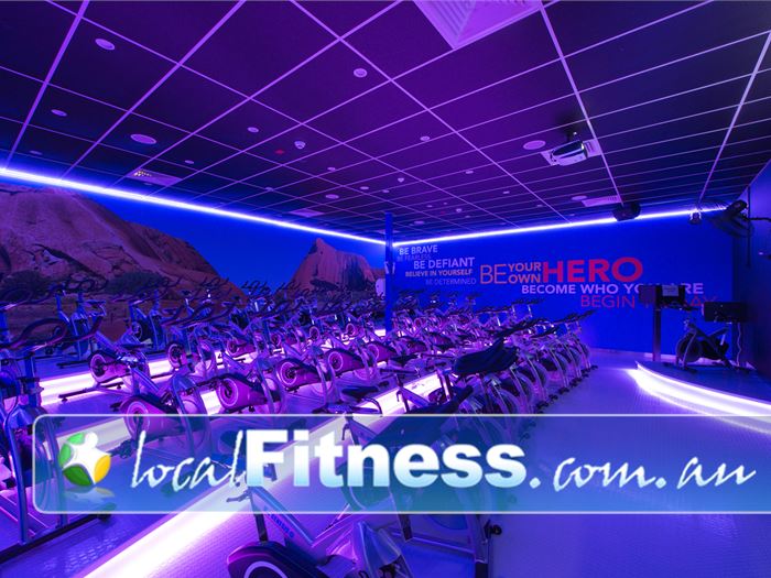 Genesis Health + Fitness Bentley State of the art cycle bikes in a high energy calorie burning space.