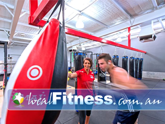 Genesis Health + Fitness Near St James Incorporate boxing and kickboxing into your fitness routine.