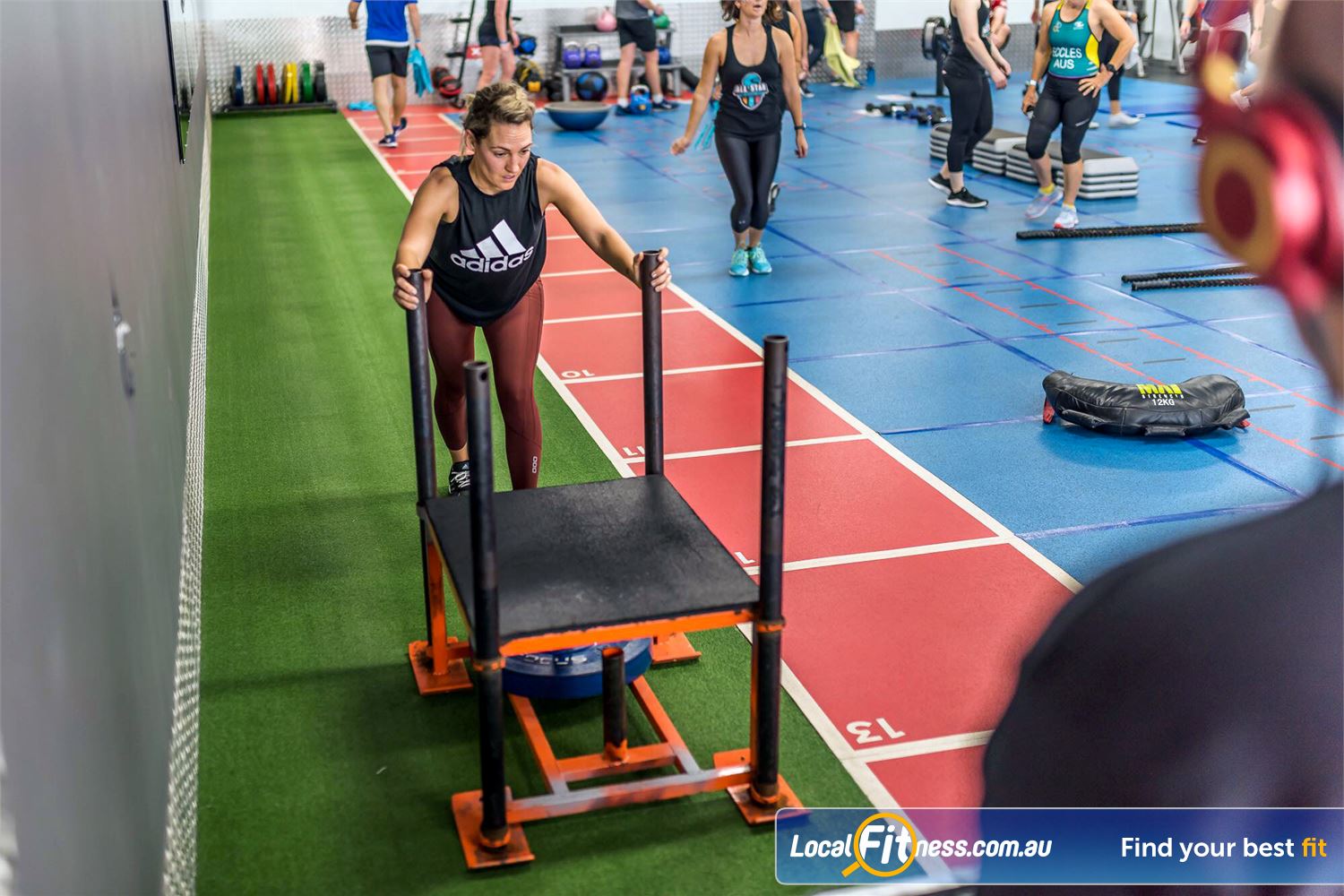 Surge Fitness 24/7 Wanneroo The indoor sled and running track in functional training area.
