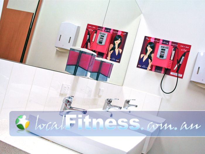 Genesis Health + Fitness Near Junction Village Clean and modern bathroom facilities.