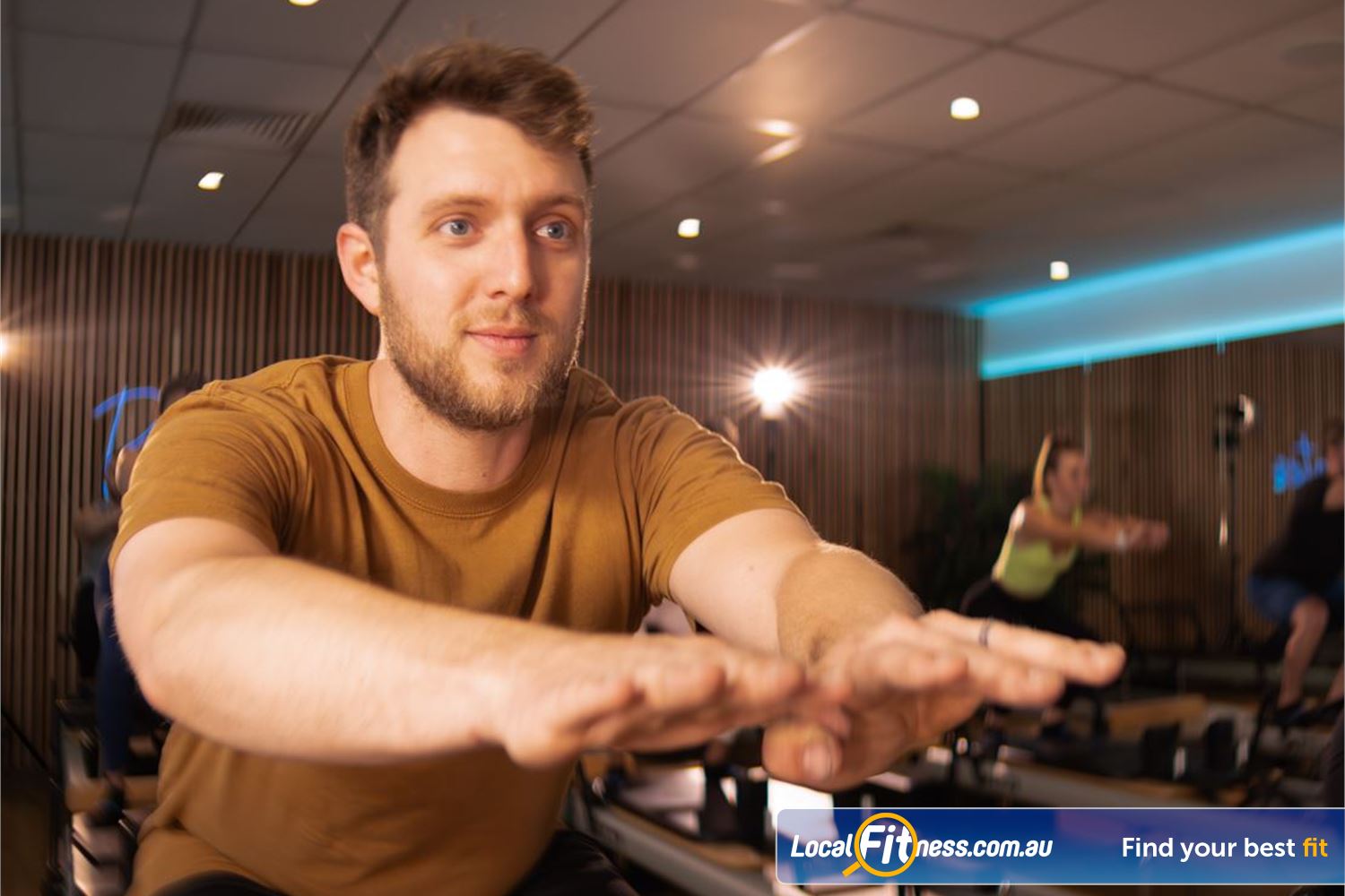 Reformer Pilates at Genesis Near Redcliffe Experience the resistance from the Reformer bed pulley system, consisting of ropes, pulleys, and adjustable springs.