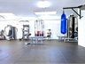Michael Wenden Aquatic Leisure Centre Miller Spacious free-weights area includes smith machines and boxing setup.